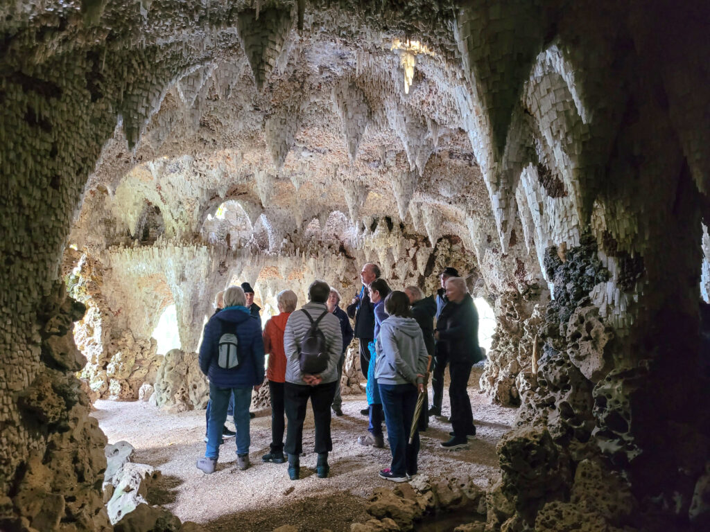 Picture of u3a members in the Crystal Grotto at Painshill Park
